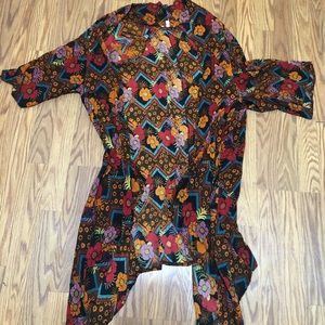 Floral cardigan, slightly worn.